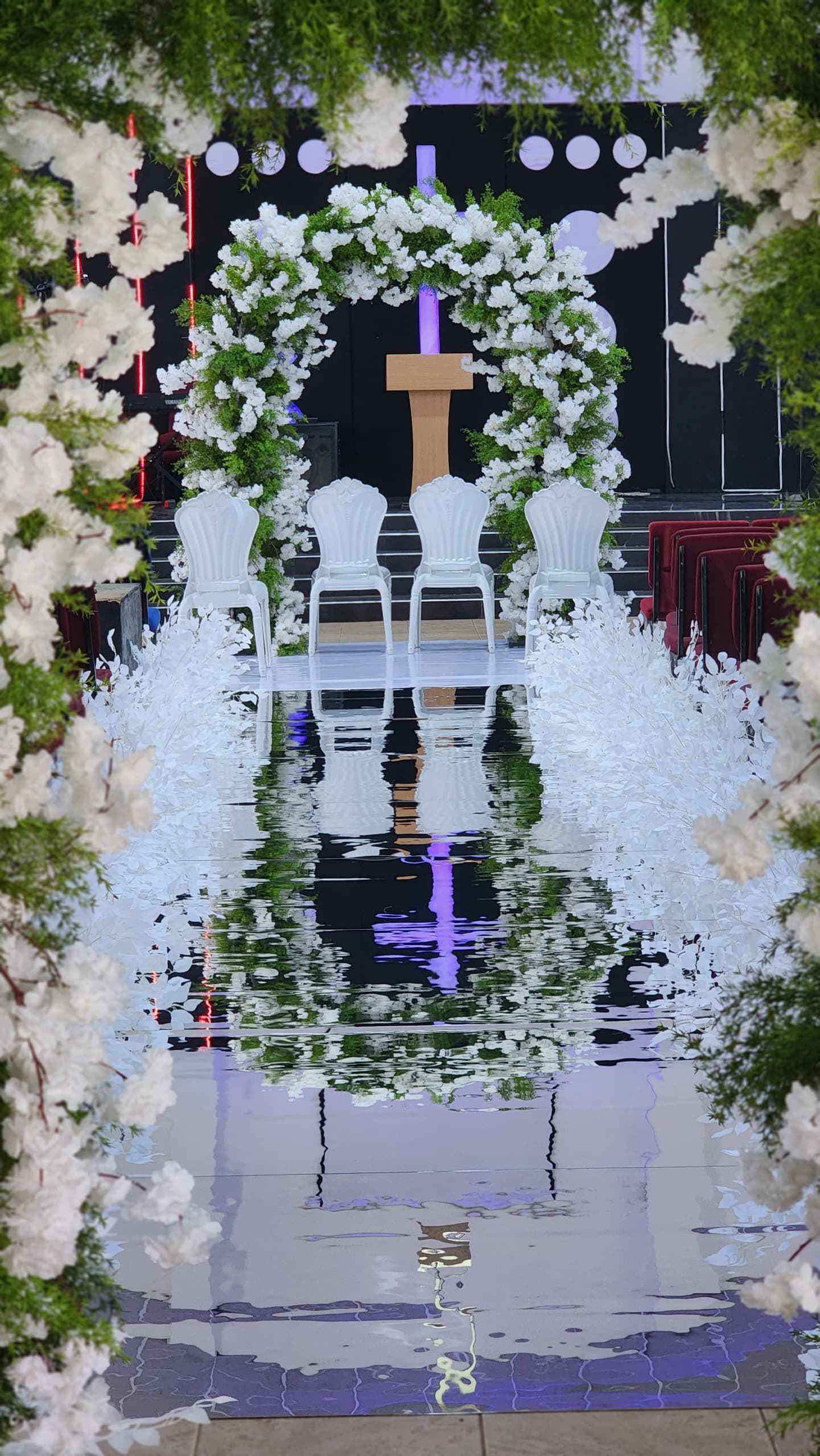 White floral wedding aisle created by Pearly Petal